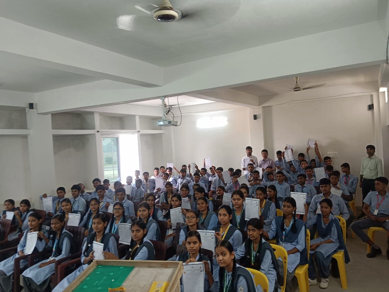 Senior school students with certificates